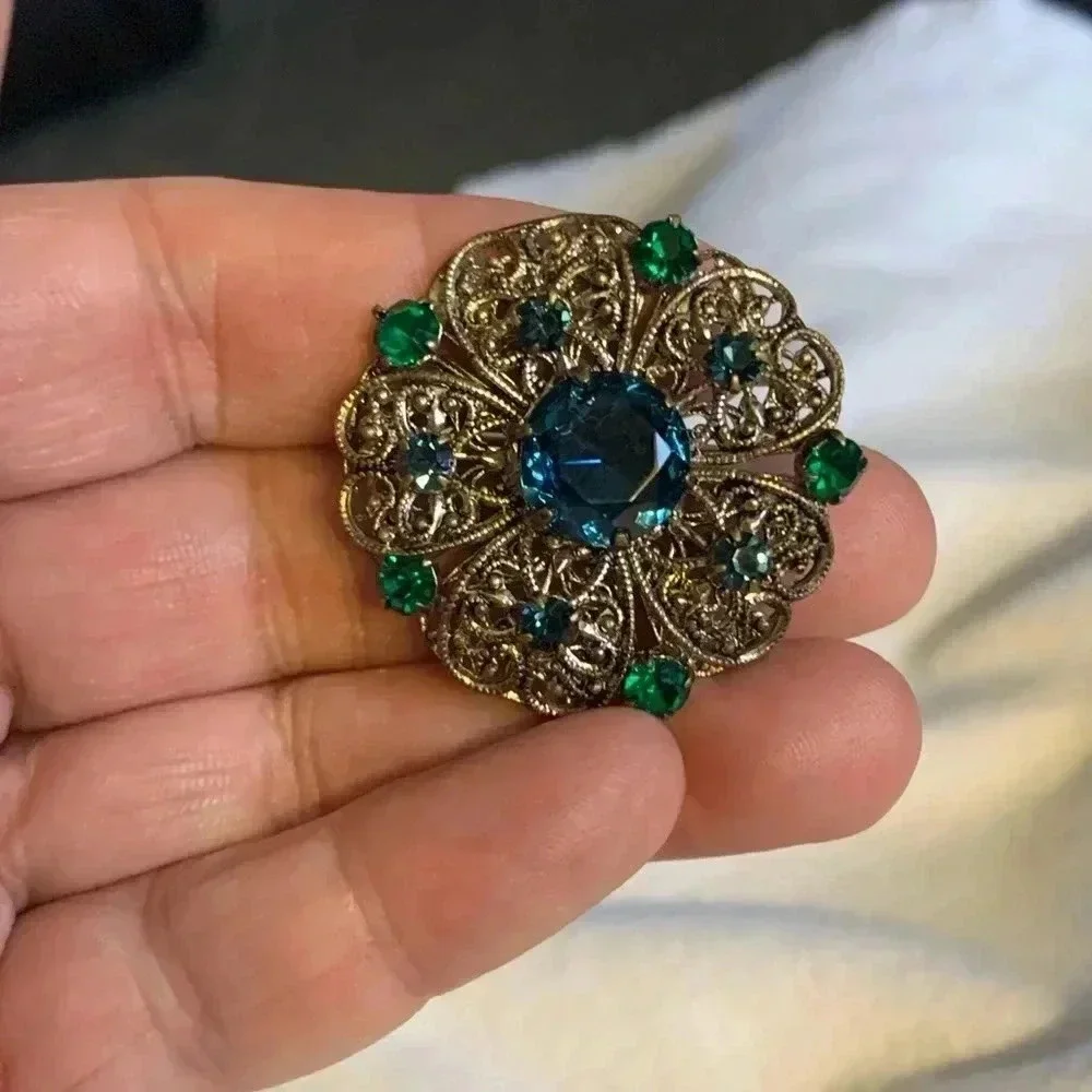 Vintage Grunge Czech glass brass filigree brooch w/ blue & green faceted stones